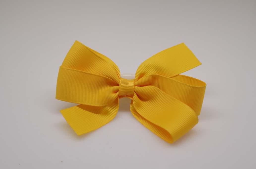 Large pinwheel hair Bow with colors  Gold